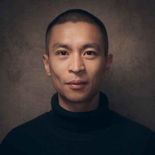 Anthony Lau looking directly at the camera.