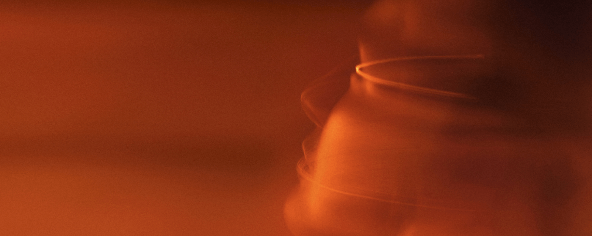 Blurred silhouettes of a persons face in a soft background