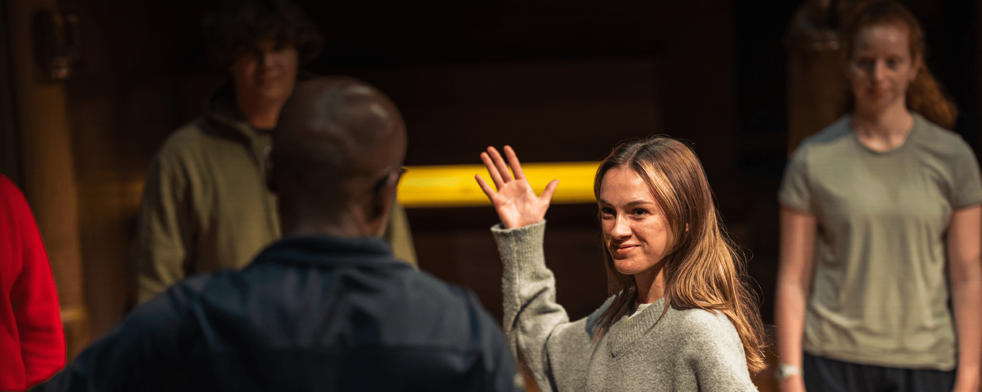 Photo of people acting in a workshop