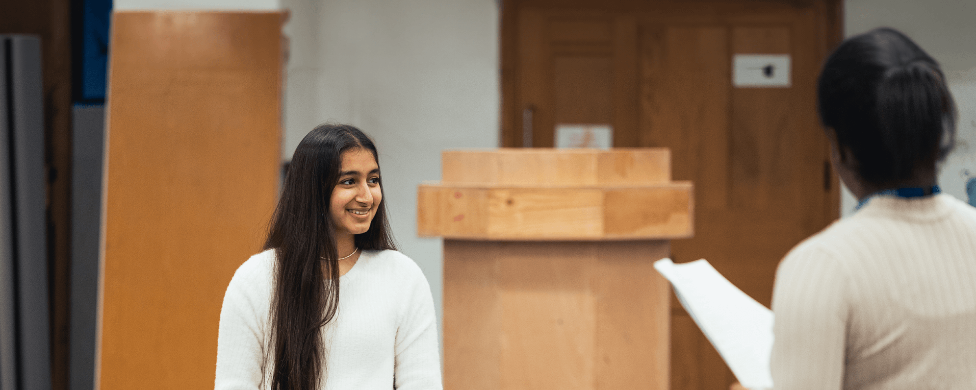 Young people in a rehearsal room