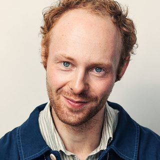 Headshot of Os Leanse looking directly at the camera.