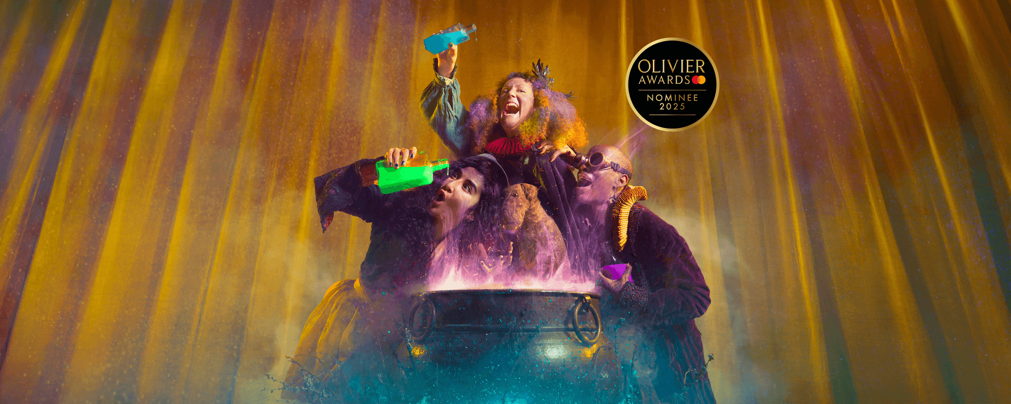 Lively photo of three people and a dog gathered around a magical cauldron. White text says 