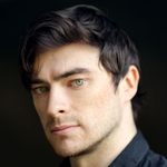 This is a headshot of Gavin Drea looking directly to camera.