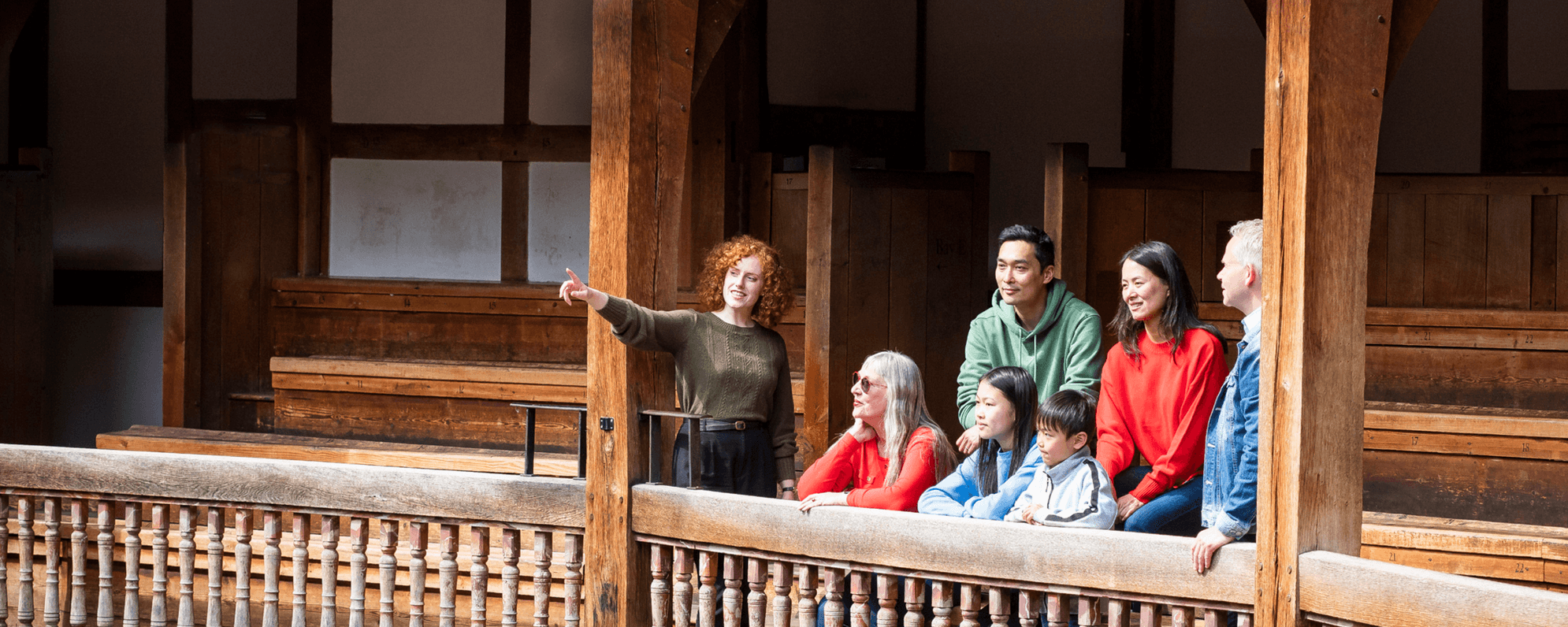 Small group on a tour of Shakespeare's Globe.