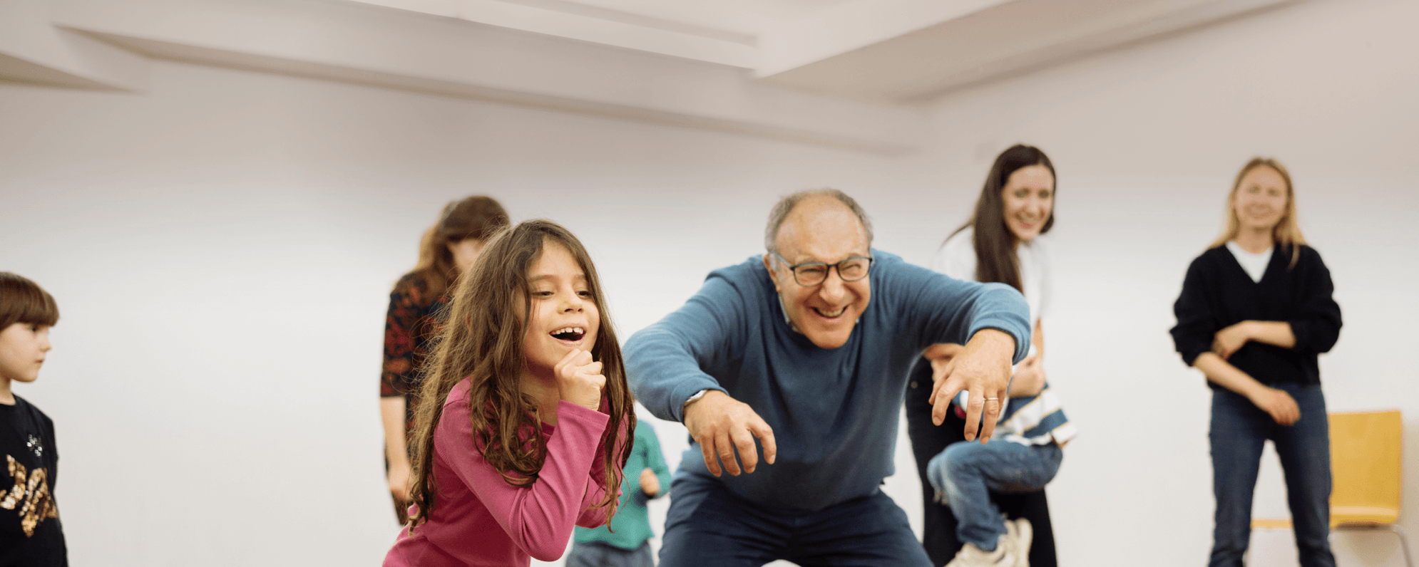 Family group acting in a rehearsal room