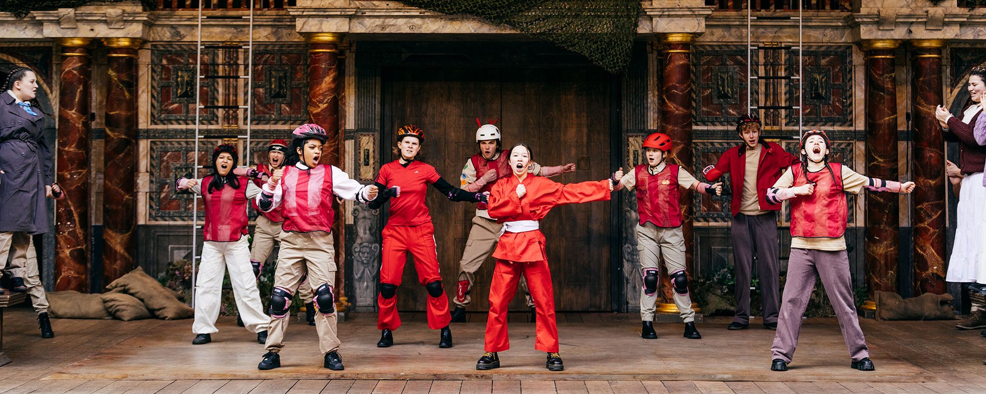 Globe Young Company on stage at the Globe Theatre.