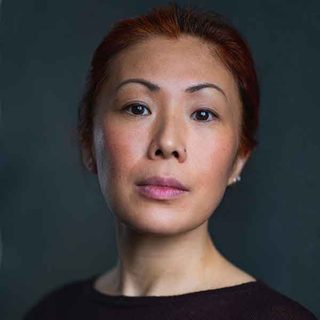 Aya Nakamura looking directly at the camera.