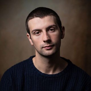 Headshot of Keaton Guimarães-Tolley looking directly at the camera.