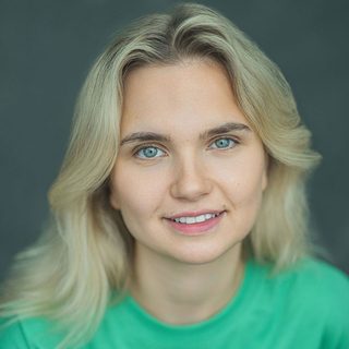 Headshot of Sophie Cox looking directly at the camera.