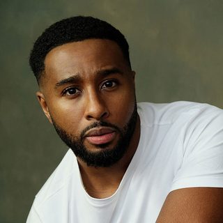 Headshot of Trieve Blackwood-Cambridge looking directly at the camera.