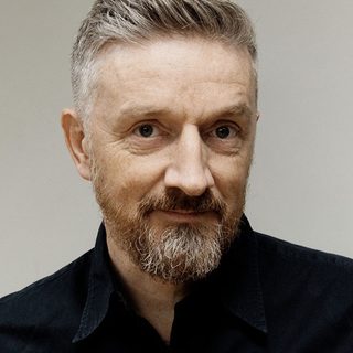 Headshot of Jonathan McGuinness looking directly at the camera.