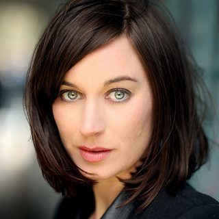 Headshot of Pippa Nixon looking directly at the camera.