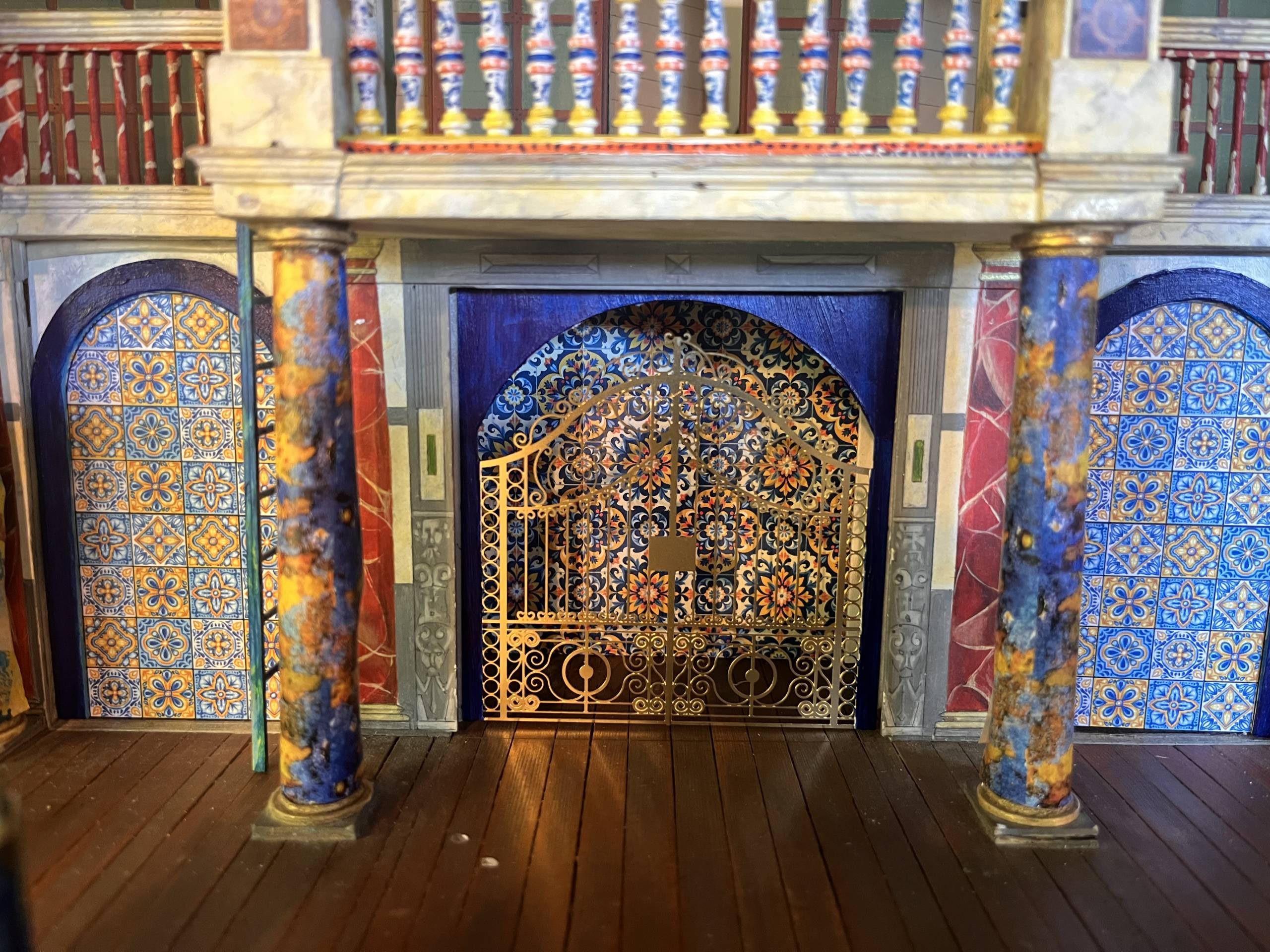 A close-up of a model box of the Globe Theatre