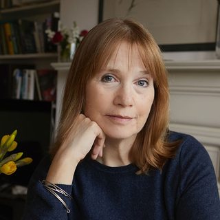 Jane Ray looking directly at the camera.