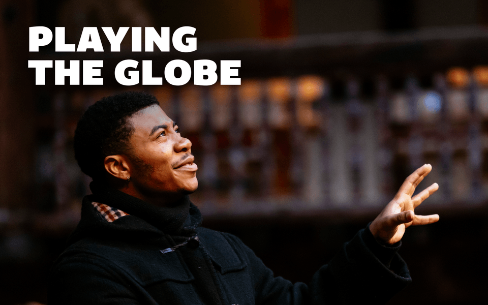Playing the Globe. A person gesturing with one hand and looking upwards.