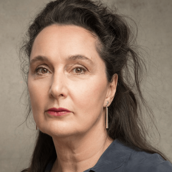 Kate Duchêne looking directly at the camera.